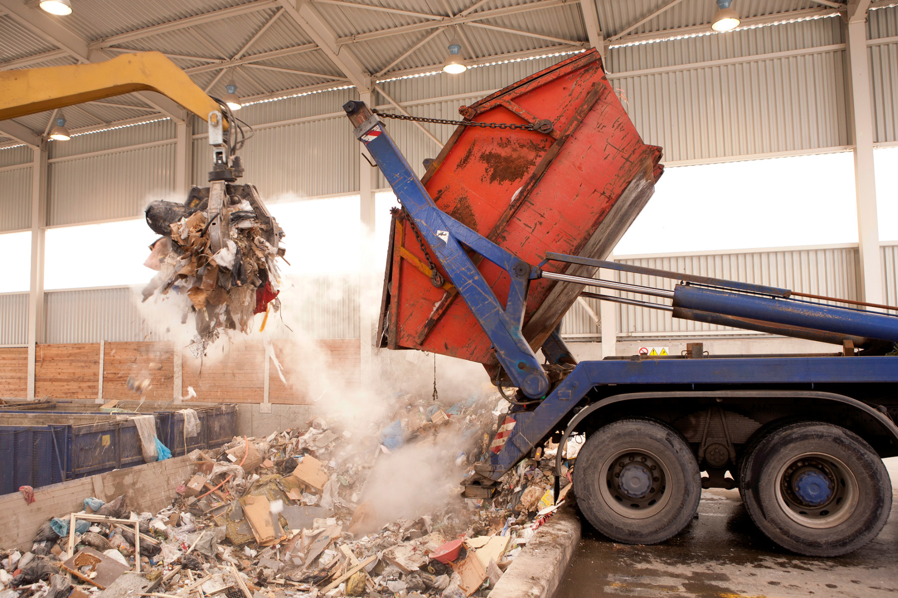 Dump truck releasing a load